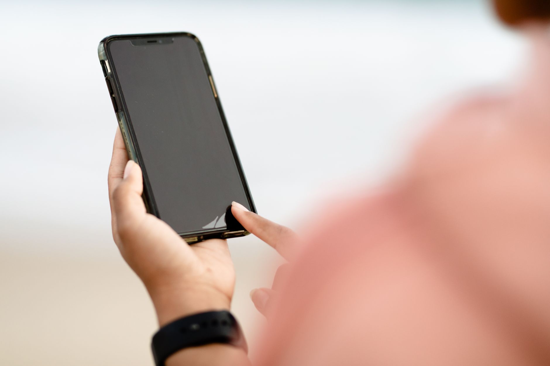 person using smartphone asking question