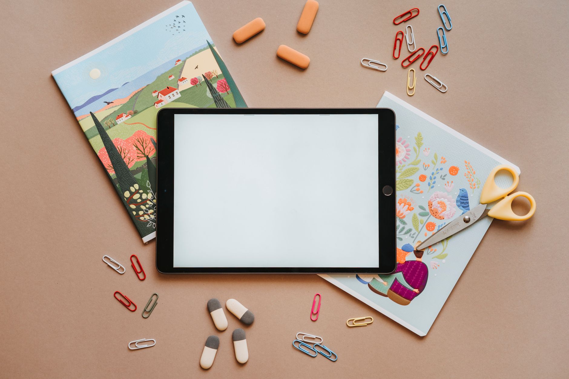 thin aluminum ereader with color screen on desk