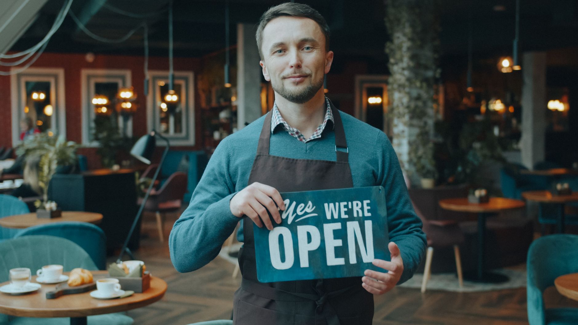 small business owner reading customer review on phone