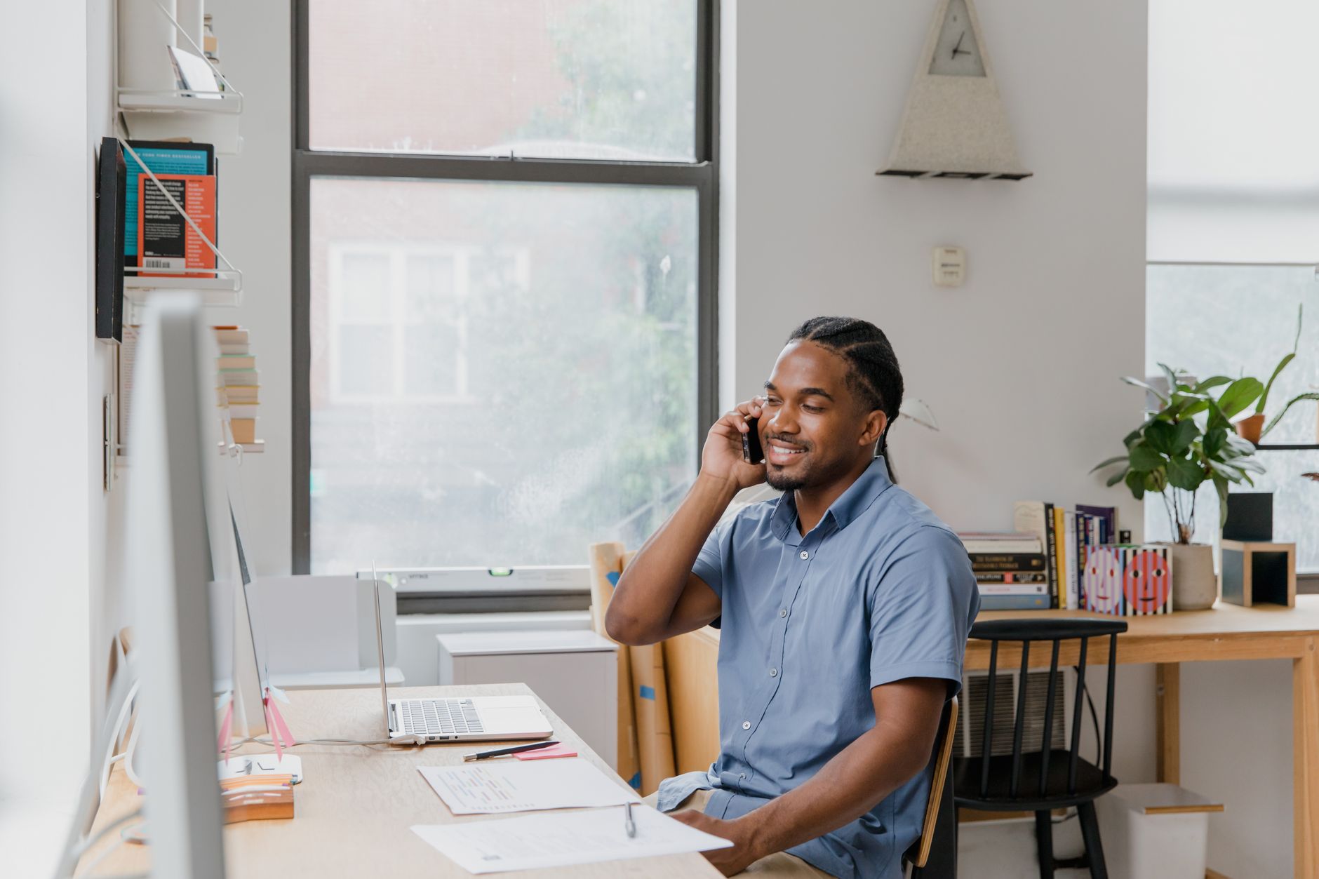 small business owner posting on phone