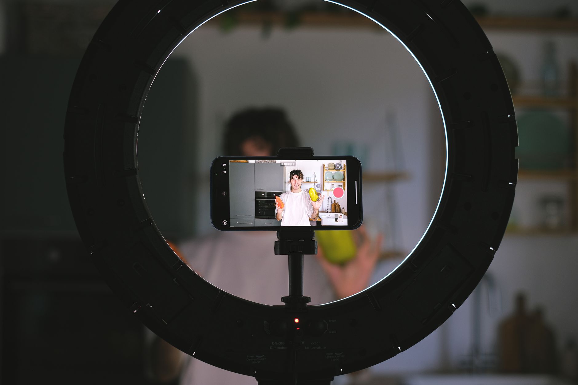 influencer filming social media content smartphone