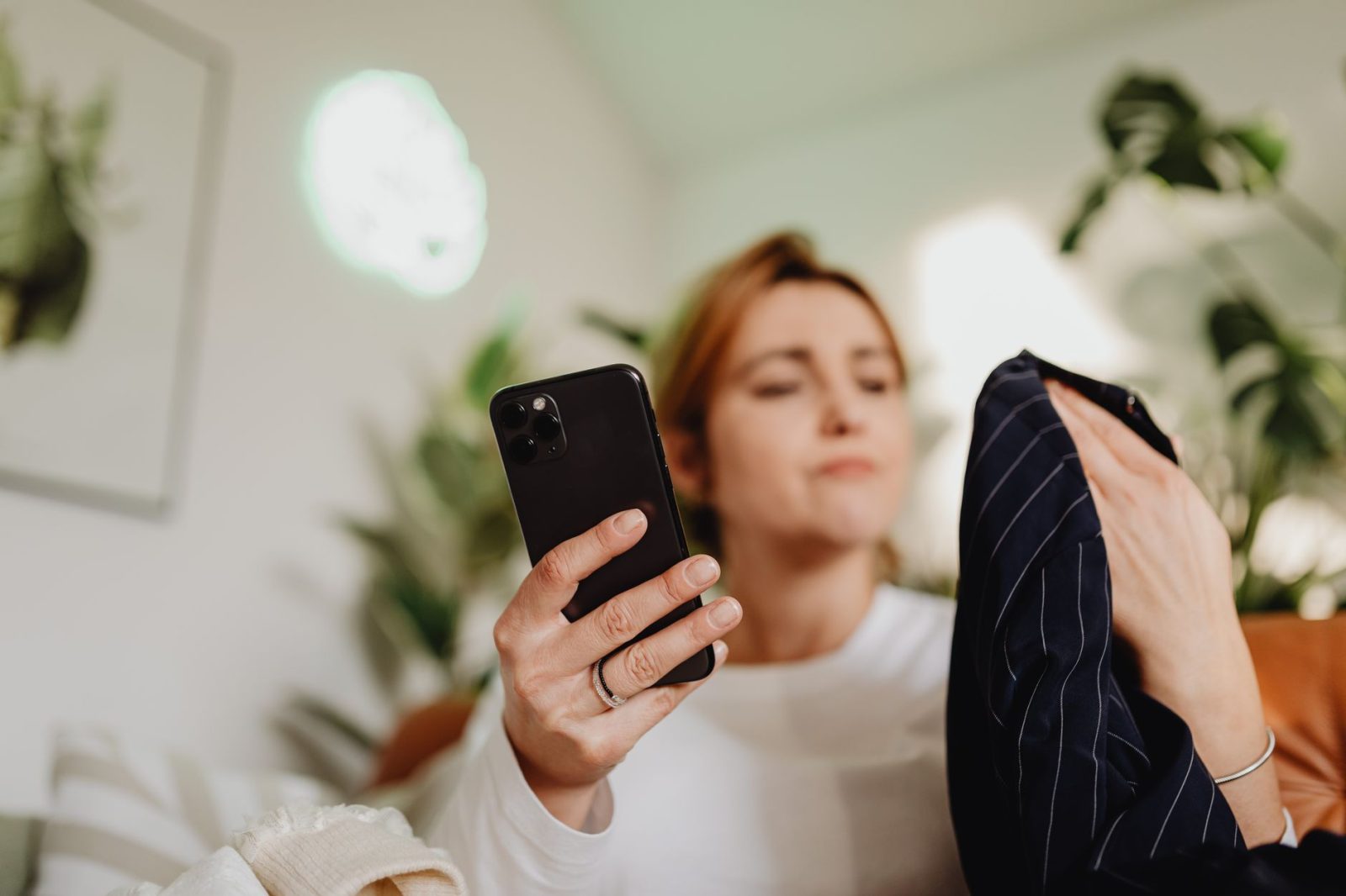 person using phone AI assistant shopping online
